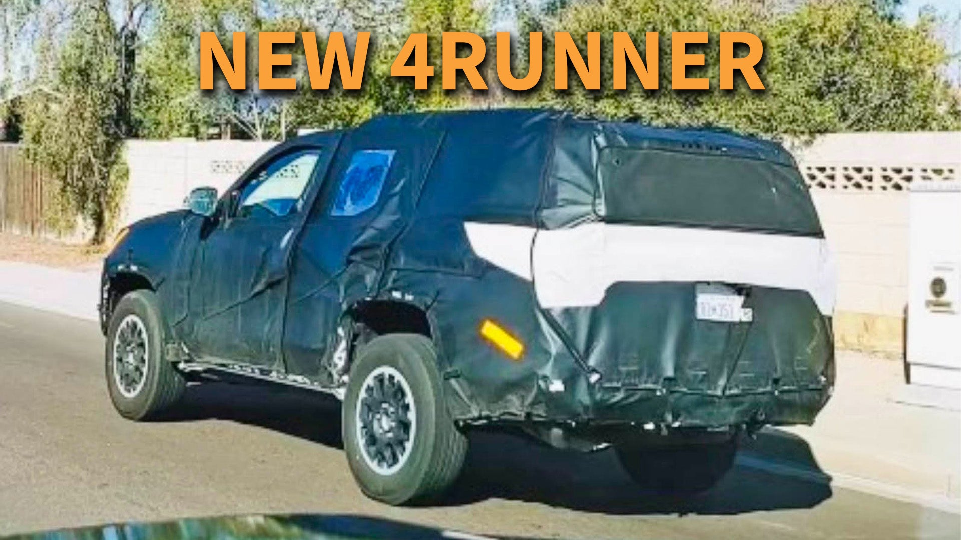 2025 toyota 4runner spied with a boxy shape and rear light bar