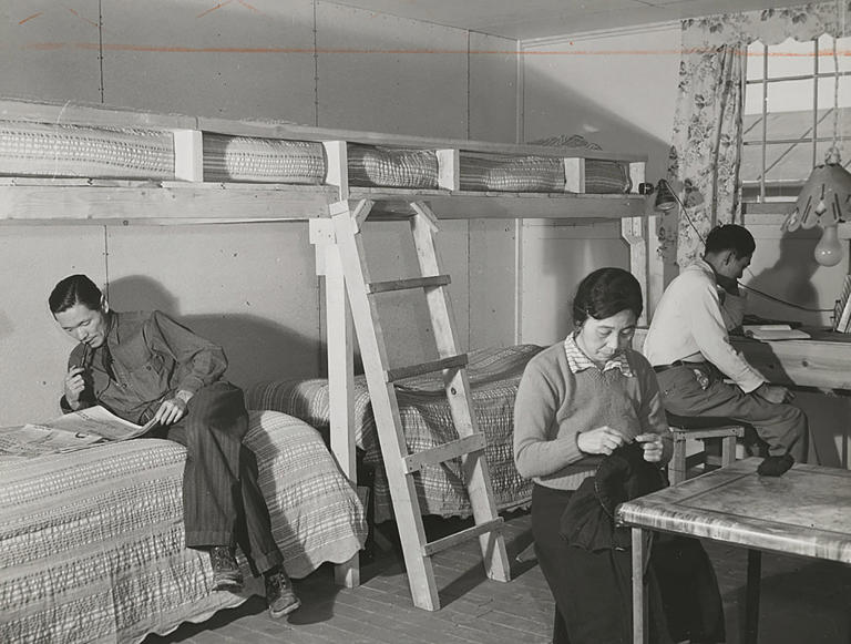 The Ninomiya family in their barracks room at the Granada Relocation Center in 1942. (Tom Parker / Library of Congress)