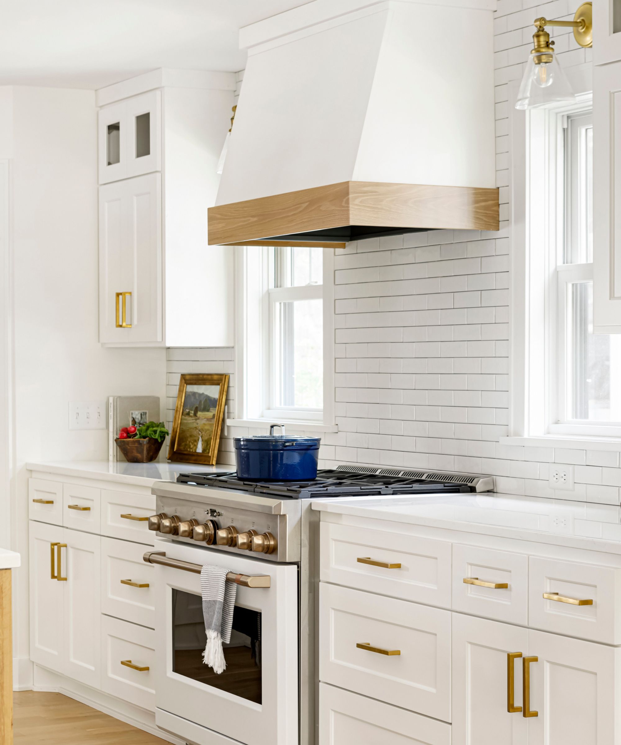 what colors work best in a kitchen with white appliances? interior designers suggest the most timeless schemes