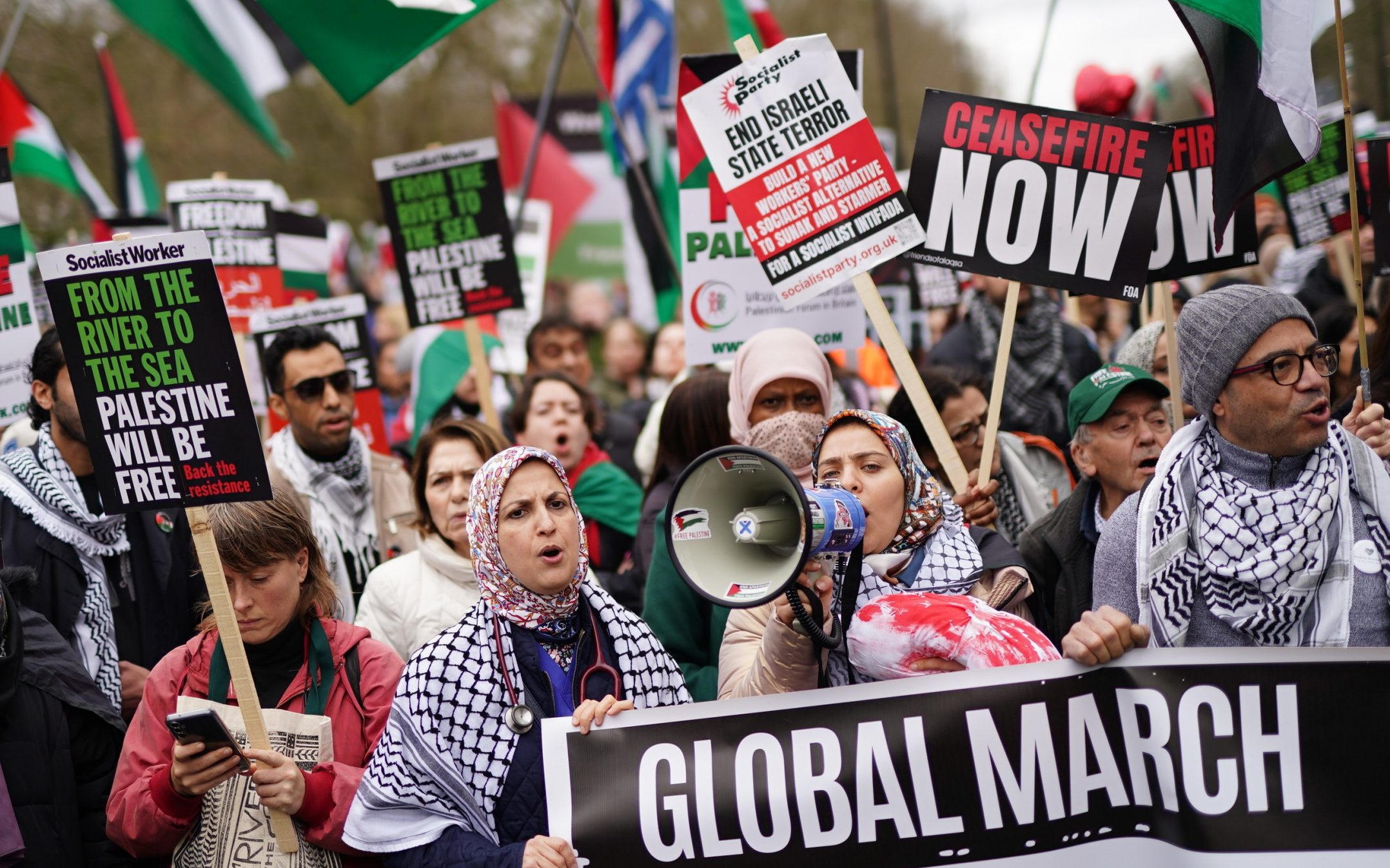 activist arrested at pro-palestine protest as thousands march to israeli embassy