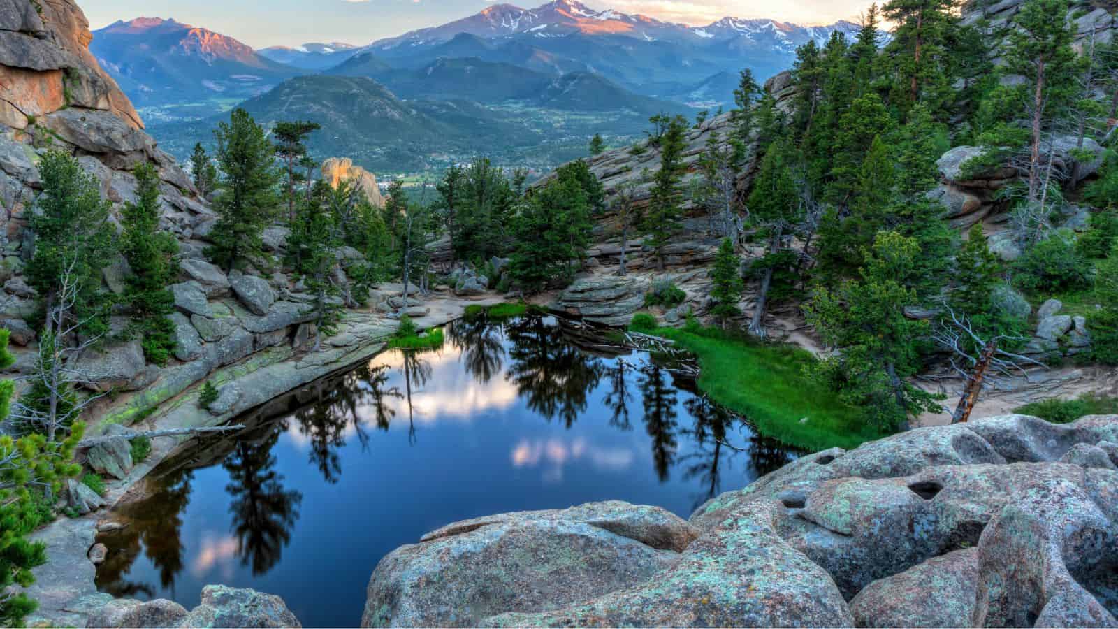 <p>This park in the Rocky Mountains of north-central Colorado is known for its alpine lakes and varied environments with wildlife like bighorn sheep and elk. Visitors can drive the 48-mile Trail Ridge Road, the highest continuous paved road in the U.S., with panoramic views of mountain peaks and valleys.</p>