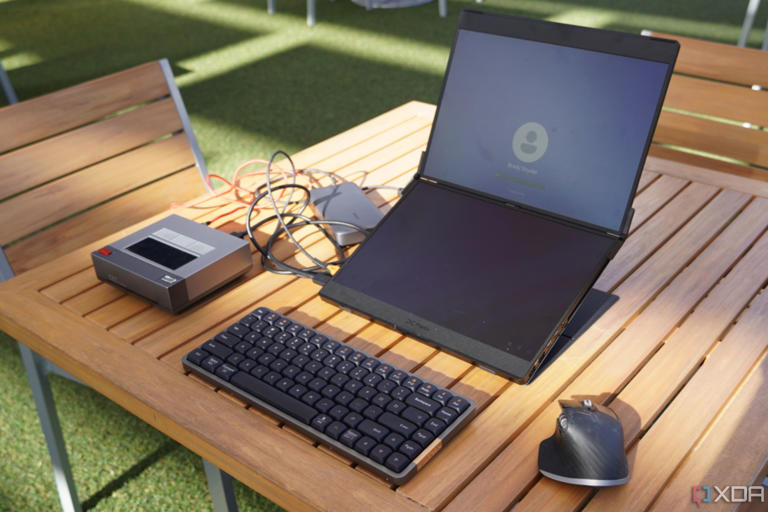 A mini PC setup on a table outdoors.