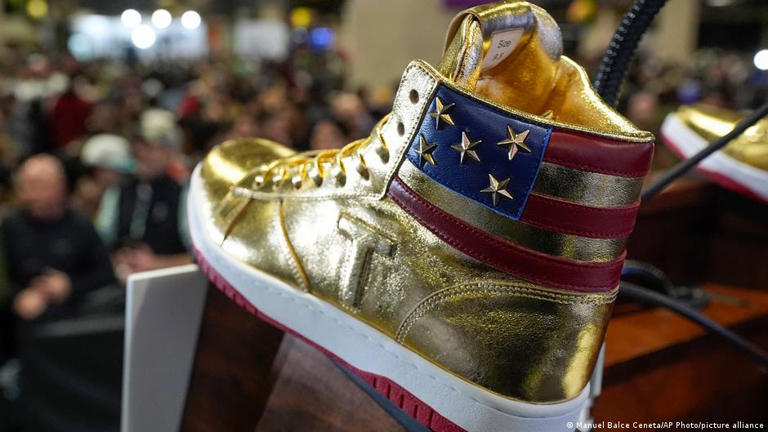 Trump hawks $399 golden sneakers after court-ordered fine