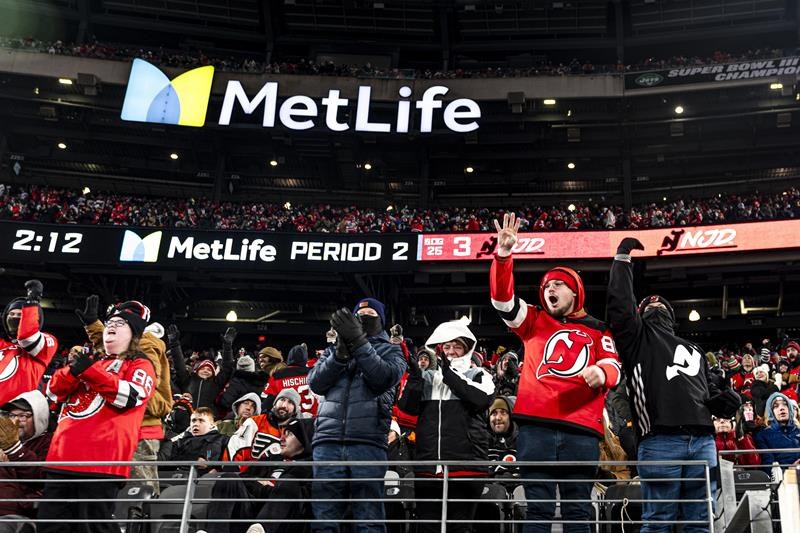 nico hischier scores twice as devils beat flyers 6-3 before of 70,328 at metlife stadium