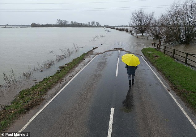 uk weather: flooding chaos across britain after met office issued new yellow warnings for rain across the south east