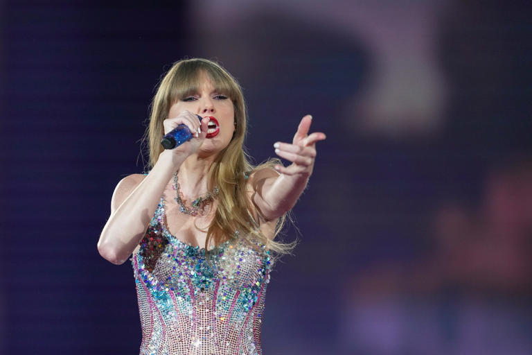 Taylor Swift performs as part of the "Eras Tour" at the Tokyo Dome, Wednesday, Feb. 7, 2024, in Tokyo. (AP Photo/Toru Hanai) ORG XMIT: LENT113