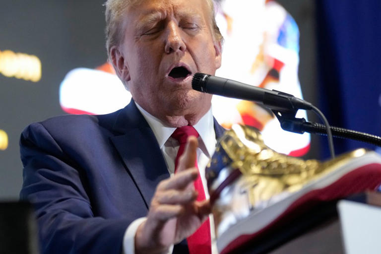 Republican presidential candidate former President Donald Trump attends Sneaker Con Philadelphia, an event popular among sneaker collectors, in Philadelphia, Saturday, Feb. 17, 2024. Trump announced a line of shoes bearing his name. (AP Photo/Manuel Balce Ceneta)