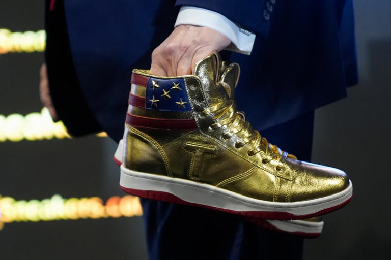 Photos Trump unveils 399 ‘Never Surrender’ sneakers day after 355M