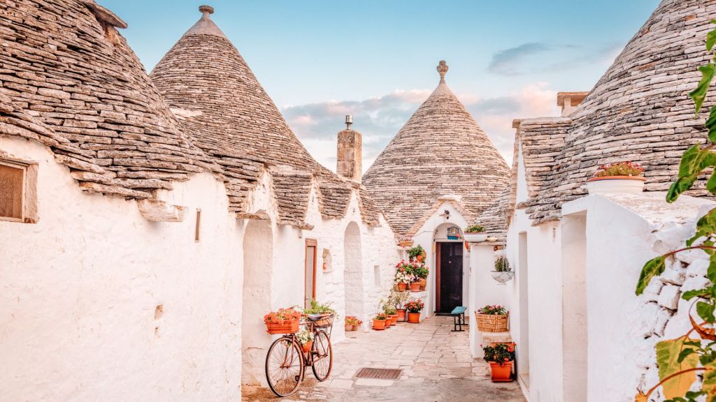 <p>Come to Puglia, close to Bari in southern Italy, to see the unique Trulli houses of Alberobello. With whitewashed walls and distinctive conical roofs, these have historically been used as homes and for storage. You can learn more about the past at the little local museum and try some authentic Italian pasta during your visit.</p><p class="has-text-align-center has-medium-font-size">Read also: <a href="https://worldwildschooling.com/underrated-european-cities/">Underrated Cities in Europe</a></p>