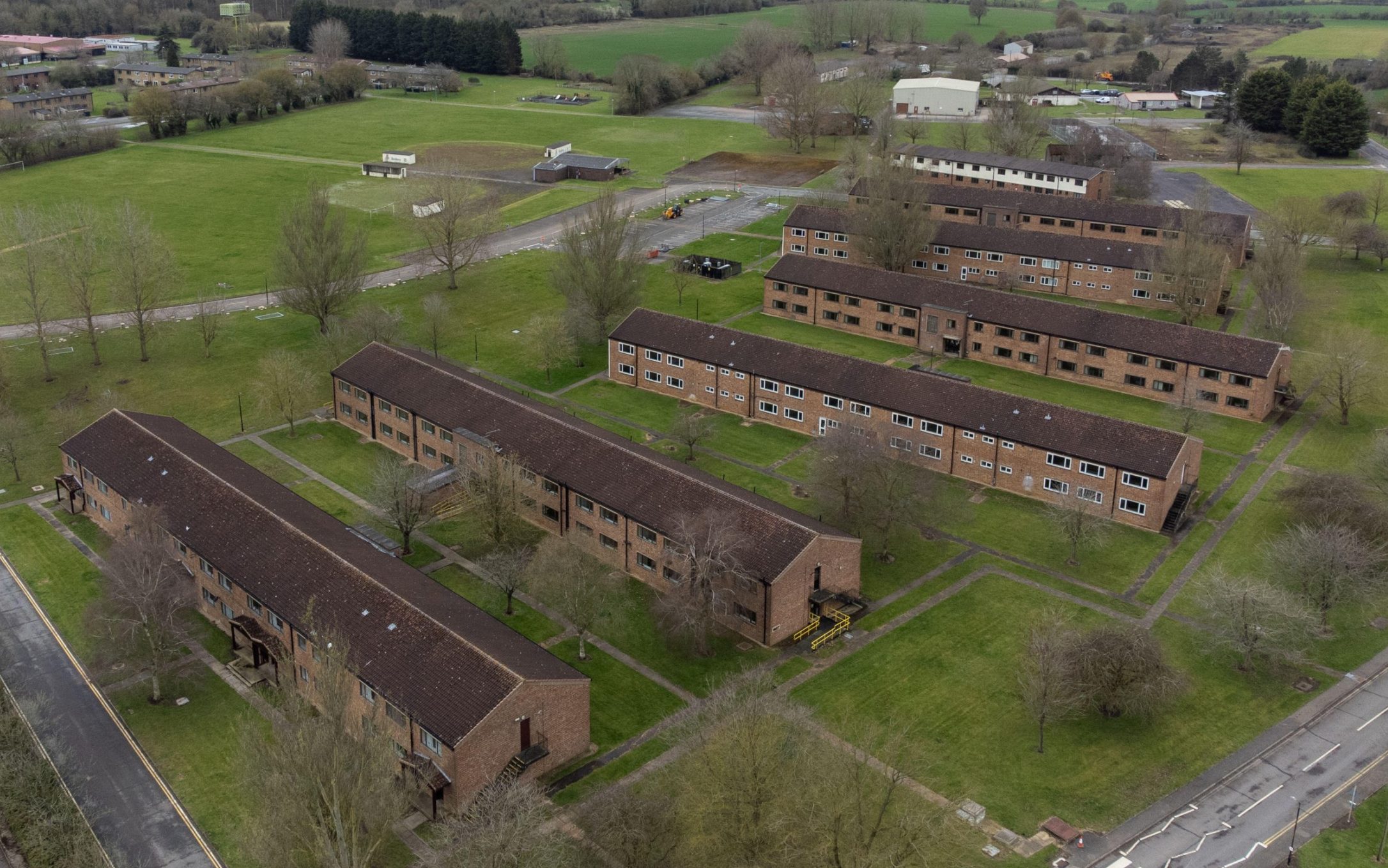 housing migrants at raf camp may cost more than hotels, ministers told
