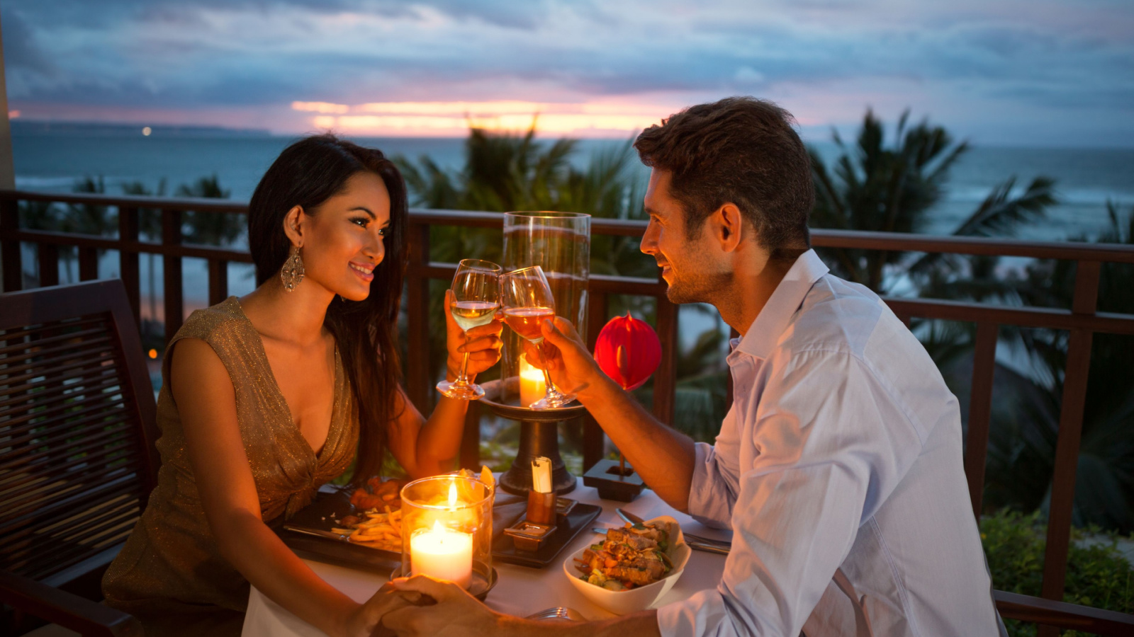image credit: Lucky-Business/Shutterstock <p><span>Pack a basket with your favorite treats and find a serene spot to watch the sunset. Sharing food in a picturesque setting creates companionship and gratitude. Conversations flow more freely under a sky painted in orange and pink hues, deepening your emotional connection. It’s a reminder of the beauty in simplicity and the joy of just being together.</span></p>