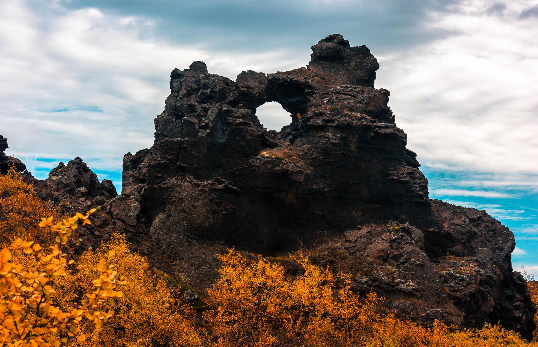 <p>A jewel of northern Iceland, Dimmuborgir, meaning dark fortress, is a stark area of lava fields close to Lake Mývatn. Formed by an eruption several millennia ago, and also serving as a location for HBO's <em>Game of Thrones</em>, the area has legends aplenty. It's believed that the rock formations are a portal to the underworld and also as the home of the Yule Lads – the 13 tricksy sons of troll Grýla, who come out at Christmastime. Chase the legends on one of several hiking routes that criss-cross the area.</p>