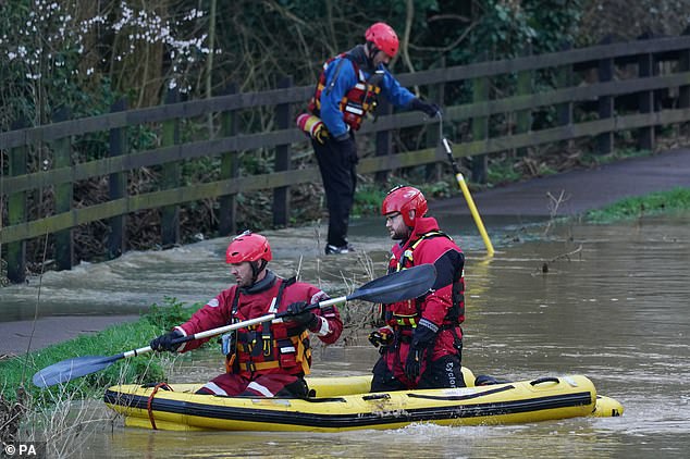 father jumped in after boy who fell into river to try and save him, police confirm as officers searching for him vow 'we will bring him home'