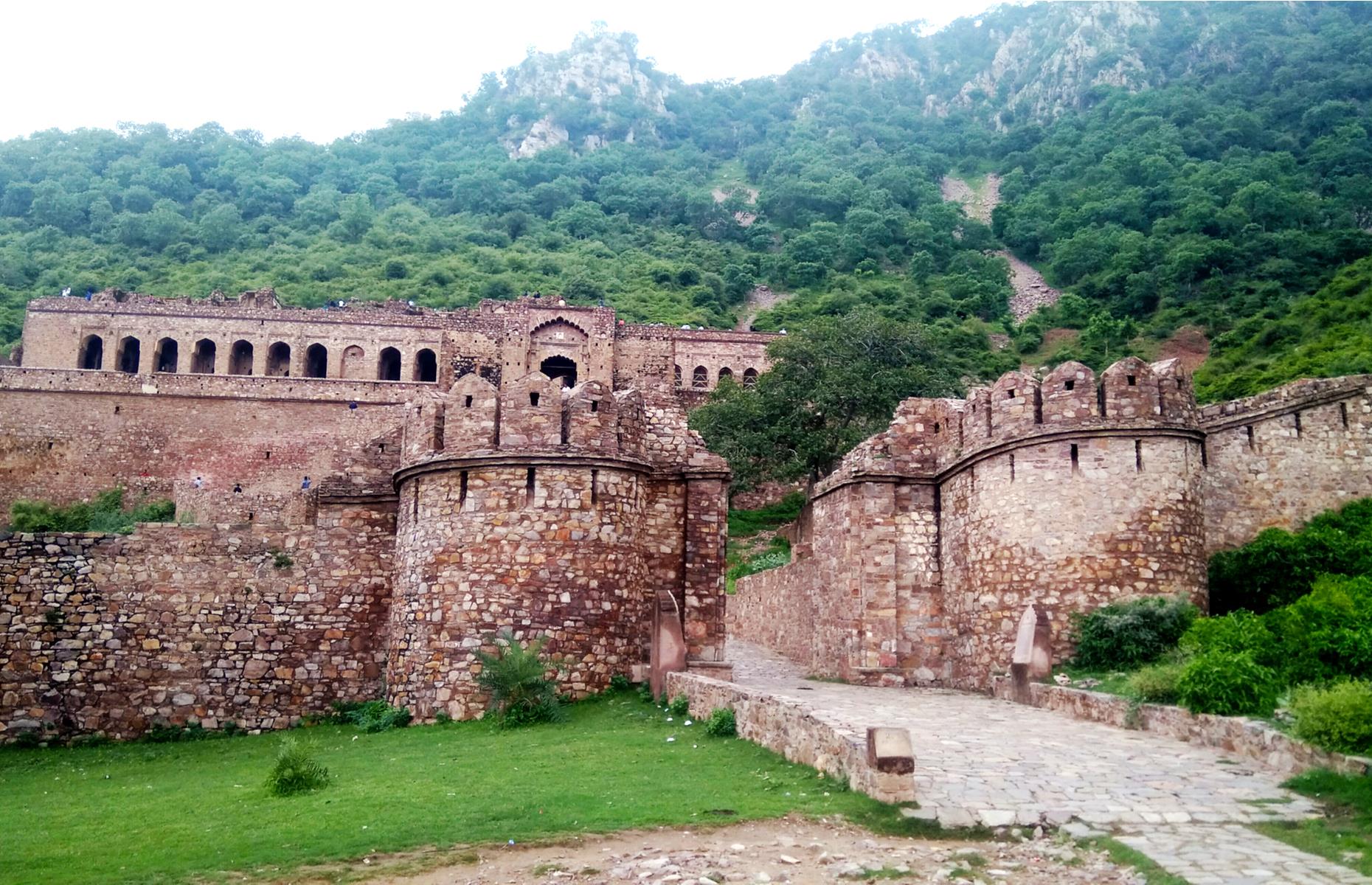 <p>Dubbed the most haunted place in India, 17th-century Bhangarh Fort is shrouded in legend. The most famous story involves a jilted wizard who fell in love with a local princess. Not able to win her affections, the wizard attempted to slip the princess a love potion. However, she saw through his cunning plan and flung the magic brew at a nearby boulder, which dislodged and crushed the ill-fated wizard. It's said the embittered wizard used his last breath to place a curse on the fort, which is now so feared that entry is prohibited after sunset.</p>
