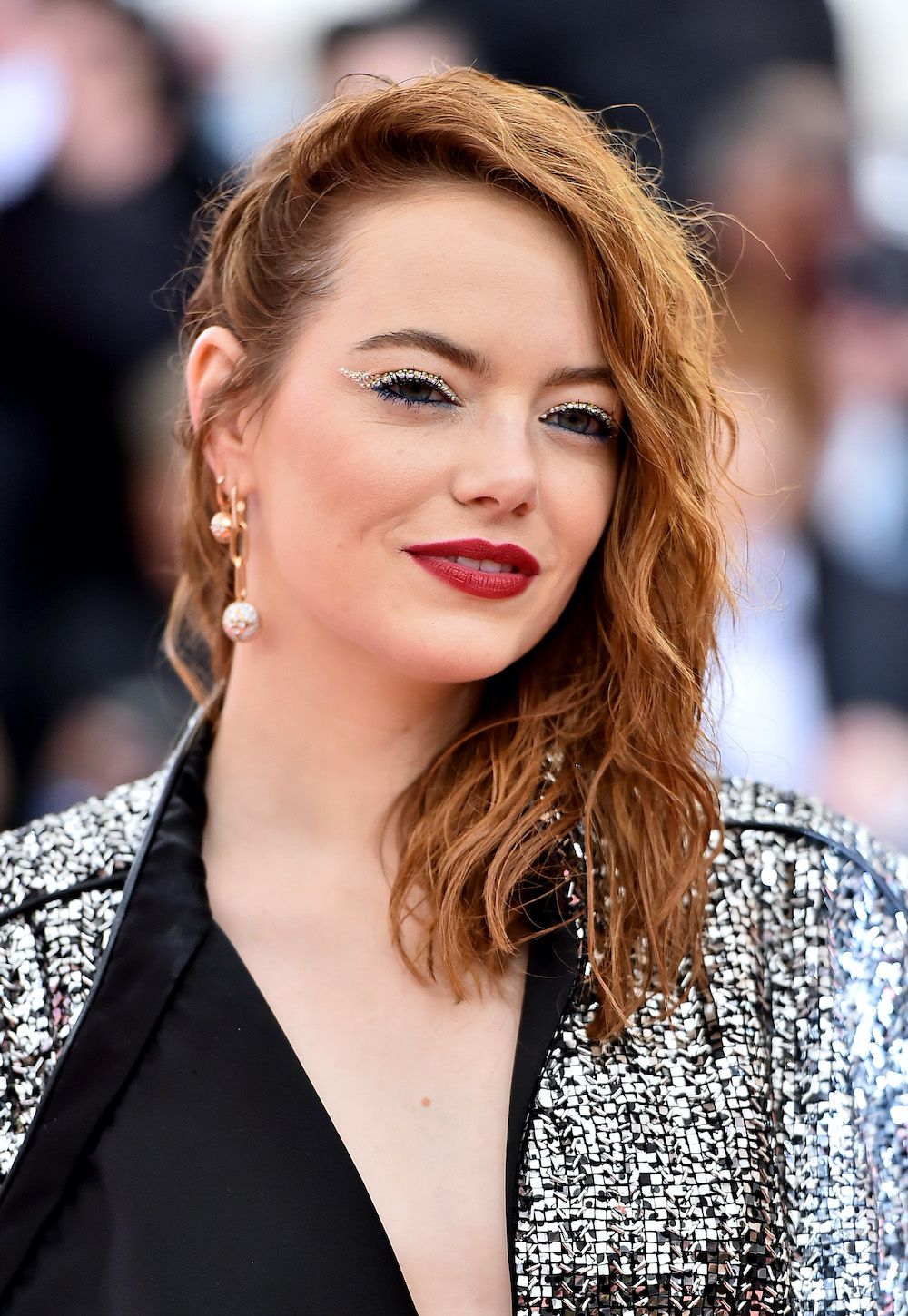 <p>                     This is a really striking take on winged liner, worn by Emma Stone to the 2019 gala. Her make-up artist Rachel Goodwin shared on Instagram that she created the bejewelled look with Swarovski crystals and blue mascara and liner for a truly eye-catching.                   </p>