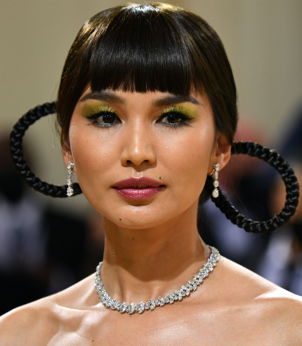 <p>                     This colour of eyeshadow looks nothing short of incredible on Gemma Chan, who paired the warm green shade with darker emerald green liner, a contrasting magenta lip and super glowy skin for her look on the 2021 Met Gala red carpet.                   </p>