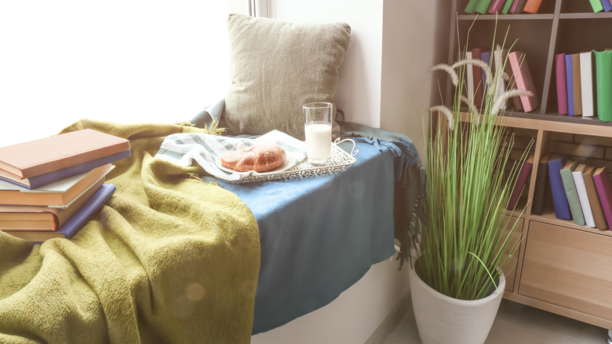 <p>If you have a small space in your house that’s not being used, then why not add a cushy pillow and a blanket to create a little nook where you can curl up and read a book or sip on a cup of coffee? It’ll be small, but you don’t need much space when you’re trying to cozy up.</p>