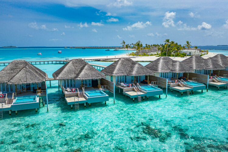<p>The Maldives is a tropical paradise with over 1,000 coral islands grouped in 26 atolls. It’s renowned for its extensive reefs, blue lagoons, and diverse marine life, making it a perfect destination for water sports enthusiasts and those seeking ultimate relaxation.</p>