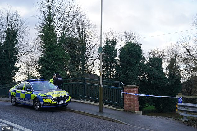 police hunt dog walker who may have seen boy, two, fall into the river soar - as specialist divers search through the night for the missing toddler