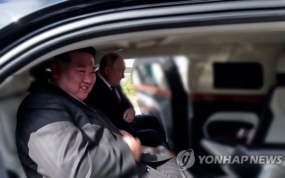putin gives kim jong-un a luxury russian-made car