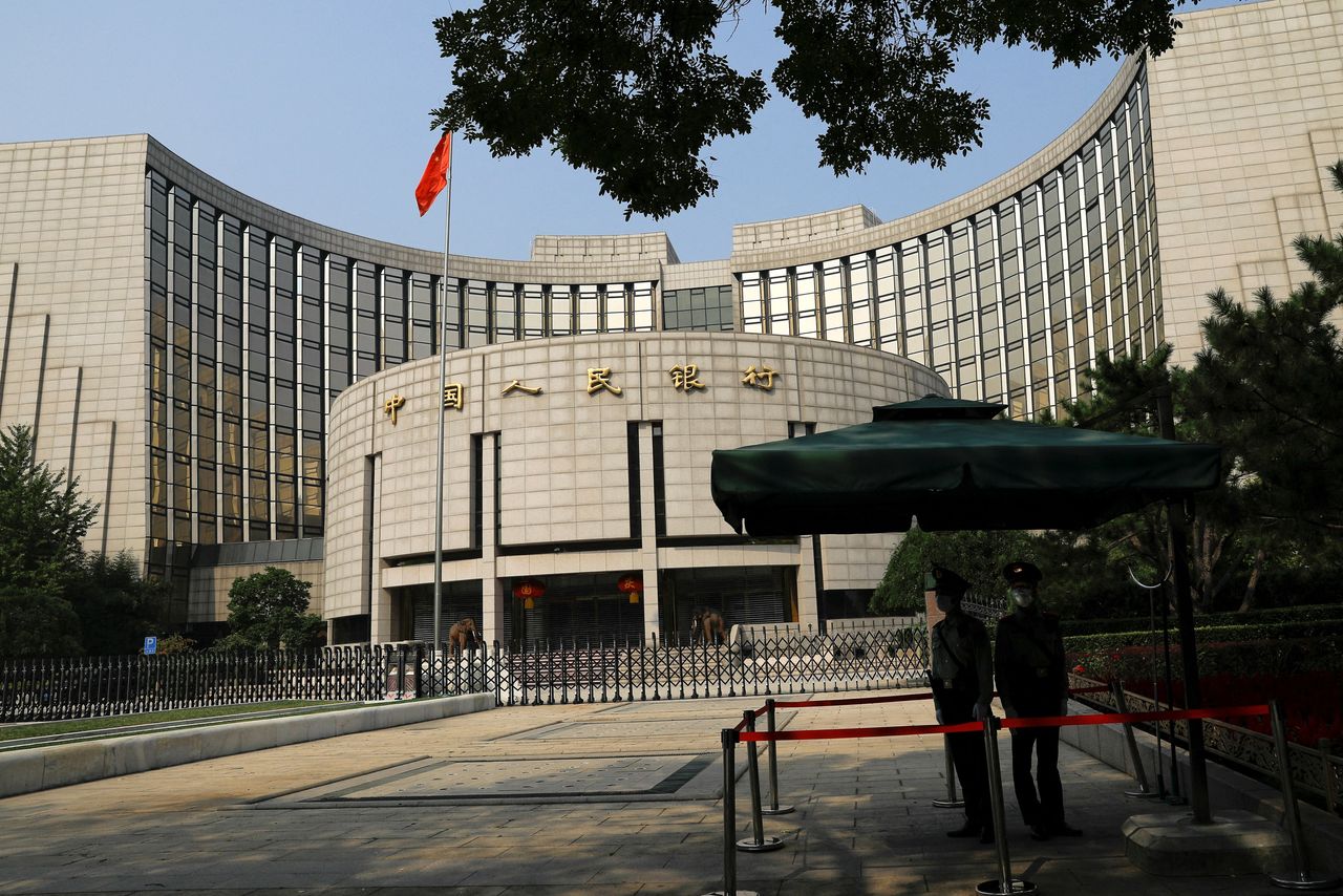 chinese banks slash a key lending rate as economy falters
