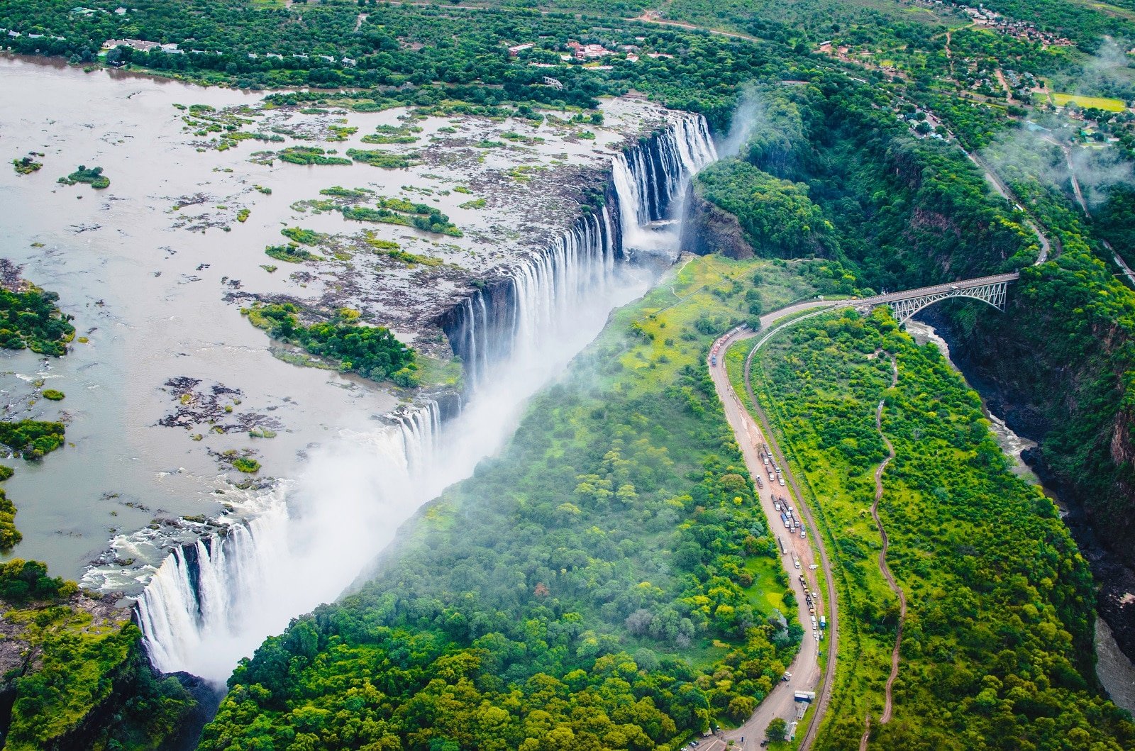 <p><span>Venture to Victoria Falls, a UNESCO World Heritage site straddling Zambia and Zimbabwe. Known locally as “The Smoke That Thunders,” this enormous waterfall is one of the largest and most famous in the world. The best views are from the Zimbabwean side, where you can see the full width and height of the falls. Consider bungee jumping or white-water rafting on the Zambezi River for an adrenaline rush. The lunar rainbow, visible during full moon nights, adds a mystical element to the falls.</span></p> <p><b>Insider’s Tip: </b><span>Take a helicopter ride for a stunning aerial view. </span></p> <p><b>When To Travel: </b><span>March to May for the fullest flow. </span></p> <p><b>How To Get There: </b><span>Fly to Livingstone Airport (Zambia) or Victoria Falls Airport (Zimbabwe).</span></p>