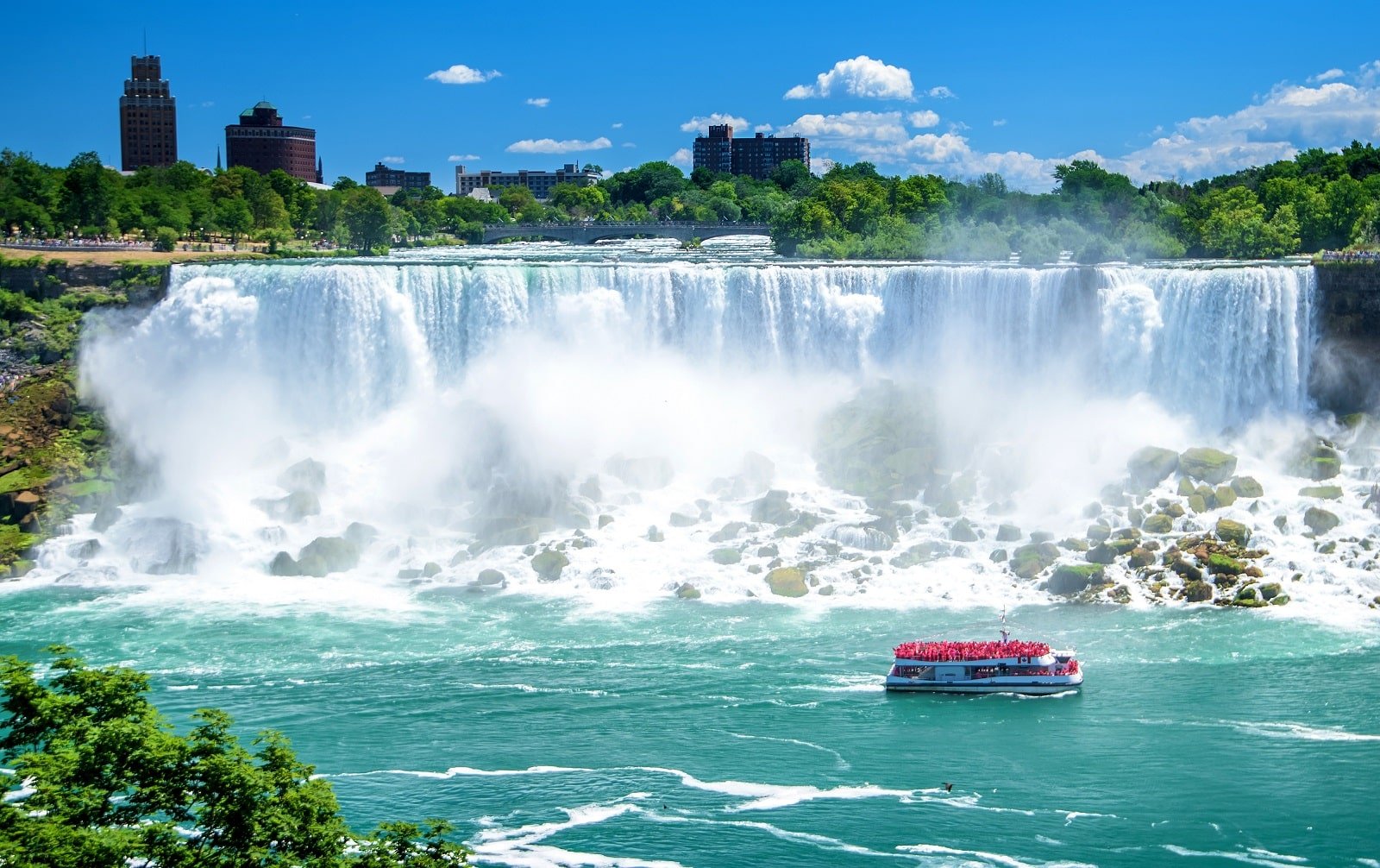 <p><span>Embark on a journey to Niagara Falls, where the sheer power of nature is on full display. These massive waterfalls, consisting of the American Falls, Bridal Veil Falls, and the Canadian Horseshoe Falls, offer a variety of experiences. The Maid of the Mist boat tour provides an up-close encounter where the roar and mist of the falls are overwhelming. Visit the observation decks or the Journey Behind the Falls for a different perspective. In the evening, the falls are lit up in a spectrum of colors, creating a breathtaking sight. The surrounding area also offers parks, gardens, and numerous vantage points to appreciate the falls’ majesty.</span></p> <p><b>Insider’s Tip: </b><span>Visit during the off-season to avoid crowds. </span></p> <p><b>When To Travel: </b><span>Late spring or early fall for pleasant weather. </span></p> <p><b>How To Get There: </b><span>Easily accessible from Buffalo, New York, or Toronto, Canada.</span></p>