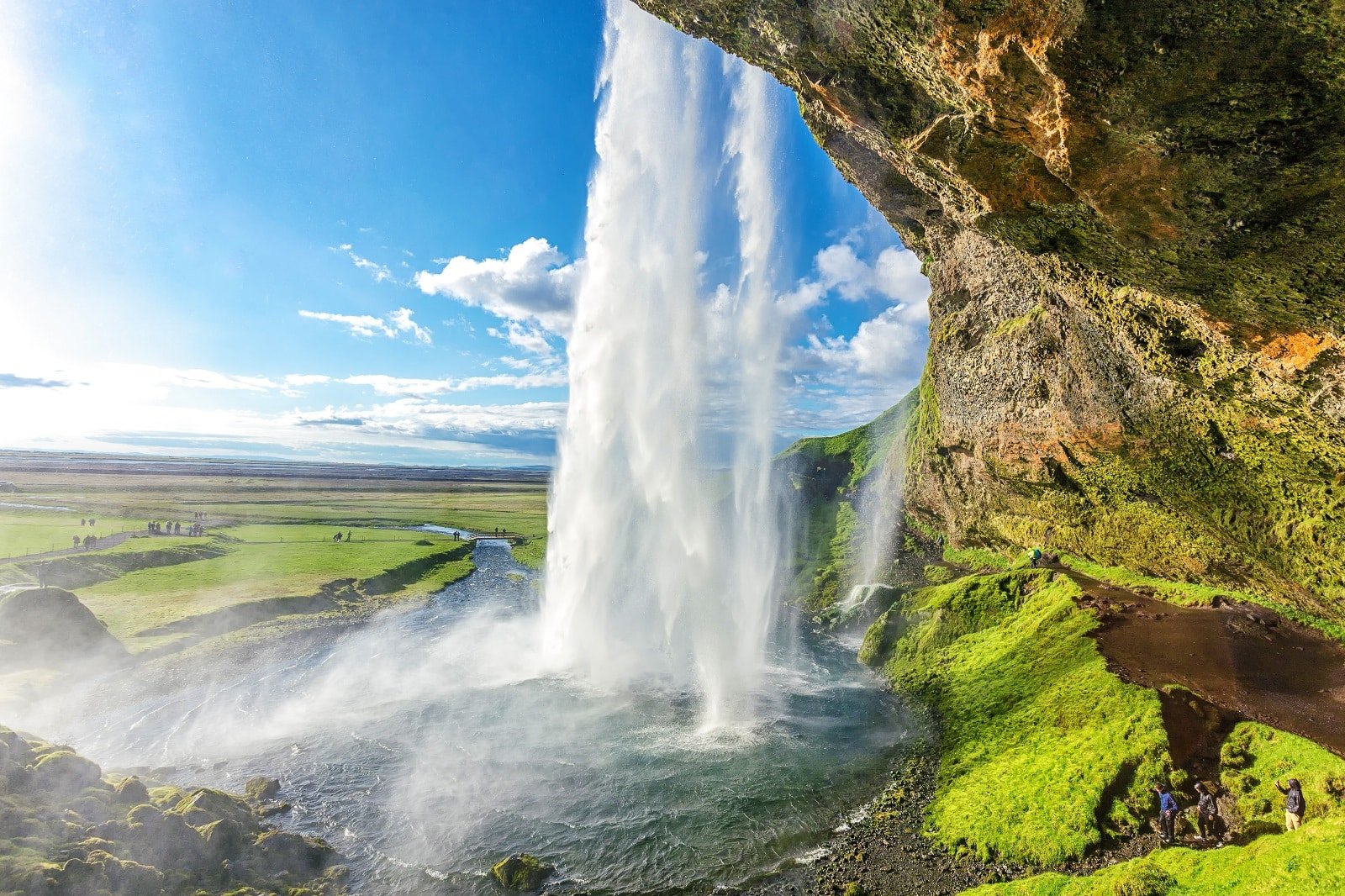 <p><span>Experience the unique beauty of Seljalandsfoss in Iceland, one of the few waterfalls you can walk behind. This 60-meter-high waterfall, part of the Seljalands River, cascades over a cliff, allowing visitors to walk behind it for a unique perspective. The path can be slippery, so waterproof gear is recommended. The waterfall is particularly picturesque during the long summer days but offers a magical sight when lit at night.</span></p> <p><b>Insider’s Tip: </b><span>Wear waterproof gear if you plan to walk behind the falls. </span></p> <p><b>When To Travel: </b><span>Summer for easier access and longer daylight hours. </span></p> <p><b>How To Get There: </b><span>Drive from Reykjavik along the South Coast.</span></p>