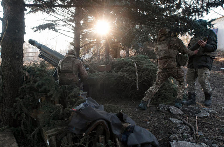 Ukrainian soldiers defending their position near Avdiivka in the Donetsk region (EPA)