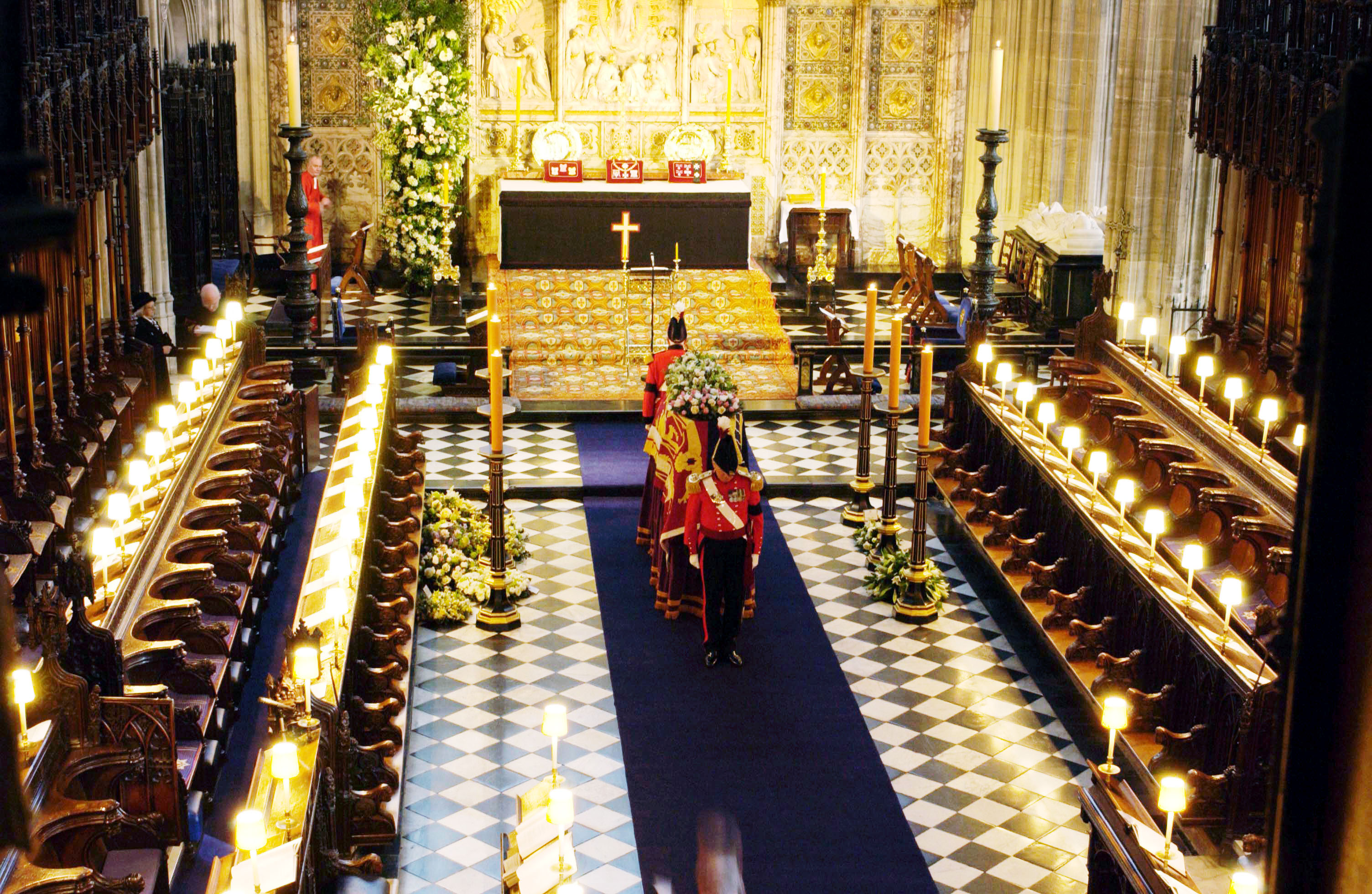 <p>Two military knights guarded the coffin of Princess Margaret before her funeral in St. George's Chapel in Windsor Castle in Windsor, England, on Feb. 15, 2002.</p>
