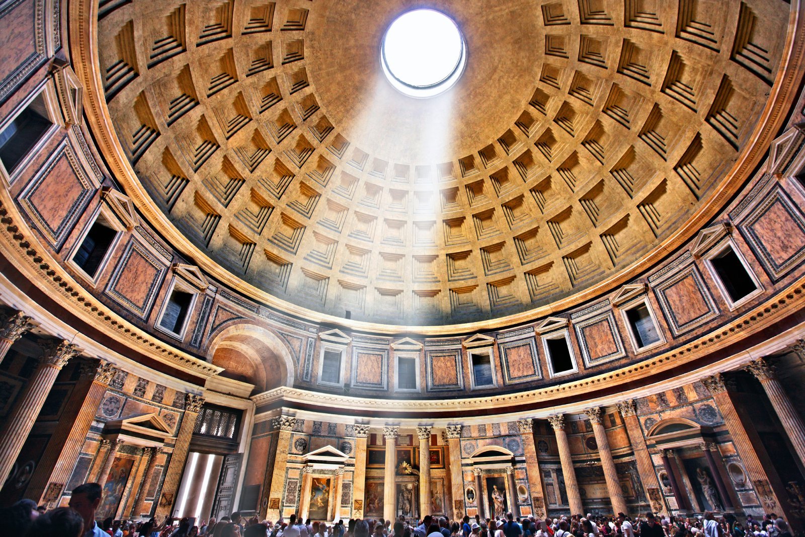 <p><span>The Pantheon, an impressive feat of ancient Roman architecture, is known for its perfectly proportioned dome, the largest unreinforced concrete dome in the world. Originally built as a temple to all gods, it now serves as a church and a tomb for notable figures, including the artist Raphael. The building’s harmonious proportions and the oculus, a circular opening at the dome’s apex, create a unique and awe-inspiring interior atmosphere.</span></p> <p><b>Insider’s Tip: </b><span>Visit on a rainy day to see the captivating sight of rain falling through the oculus and evaporating before it hits the ground.</span></p> <p><b>How To Get There: </b><span>The Pantheon is centrally located and best reached by foot from other nearby attractions like Piazza Navona.</span></p> <p><b>Best Time To Travel: </b><span>Early mornings or late afternoons are less crowded, offering a more serene experience.</span></p>
