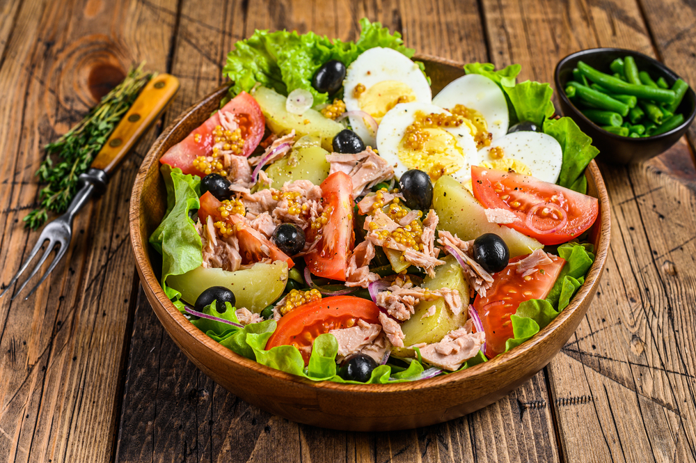 <p>Directly from the sun-drenched city of Nice, Salade NiÃ§oise is a testament to the bright, fresh flavors of the CÃ´te d’Azur. With ingredients like tomatoes, tuna, hard-boiled eggs, NiÃ§oise olives, and anchovies, this salad is a medley of textures and flavors, showcasing the fresh produce and seafood of the region. It’s a must-try for its embodiment of the light, healthful culinary style of the French Riviera.</p>