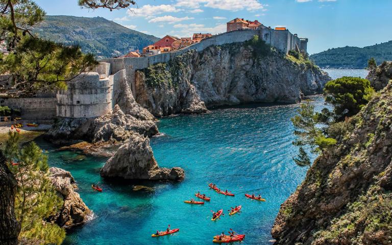 Sea kayaking is a unique way to see the famous city walls, one of the best things to do in Dubrovnik - Laurens Verhoeven