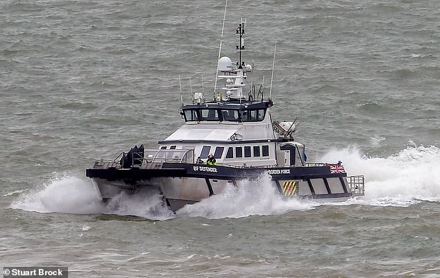 dozens of migrants brave thick fog and strong winds to cross the channel - as the number of asylum seekers illegally reaching uk on small boats this year soars past 2,000