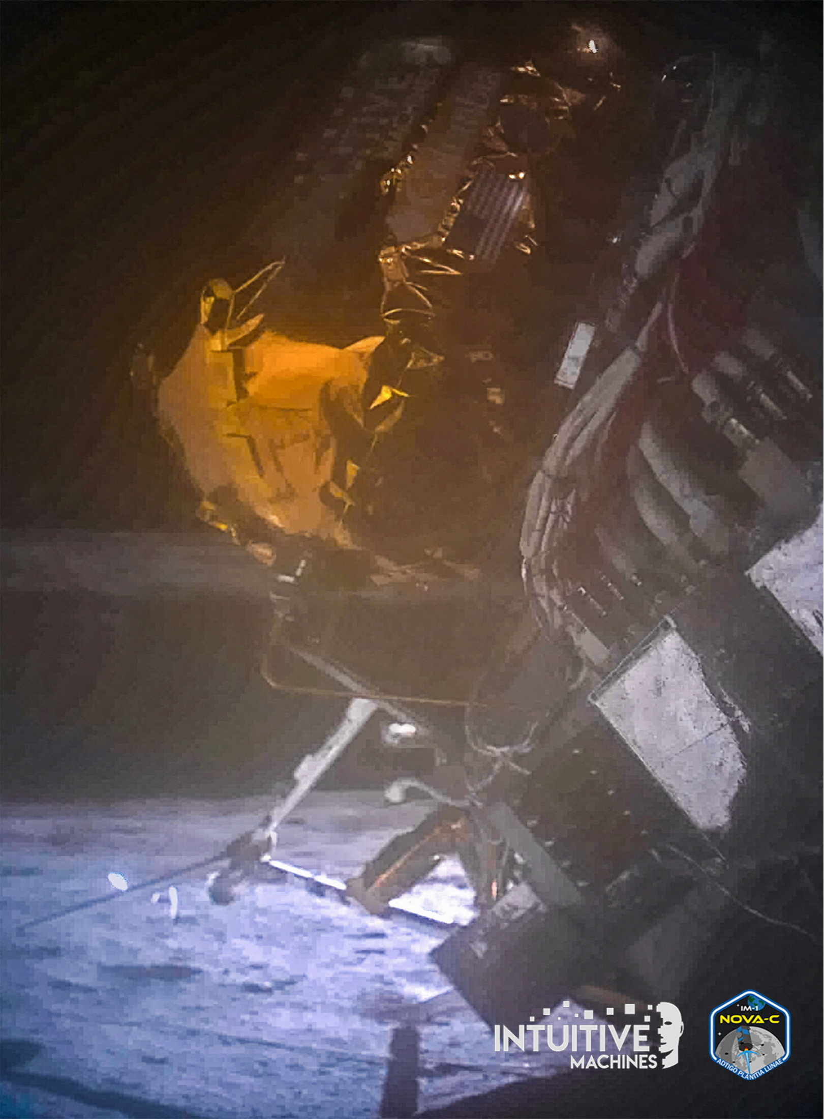 dramatic new photos show odysseus moon lander on its side with snapped leg