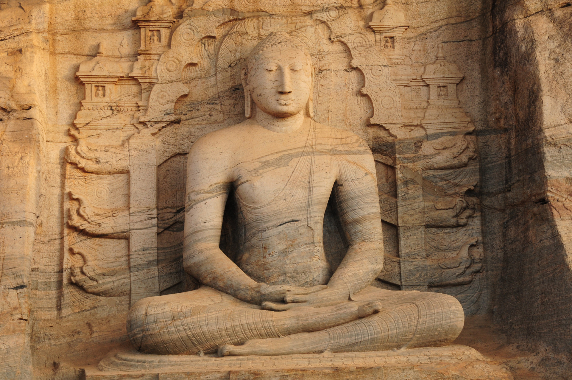 A large seated Buddha at the Gal Vihara rock temple. The statues are regarded as some of the finest examples of ancient Sinhalese sculpting and carving arts.<p><a href="https://www.msn.com/en-us/community/channel/vid-7xx8mnucu55yw63we9va2gwr7uihbxwc68fxqp25x6tg4ftibpra?cvid=94631541bc0f4f89bfd59158d696ad7e">Follow us and access great exclusive content every day</a></p>