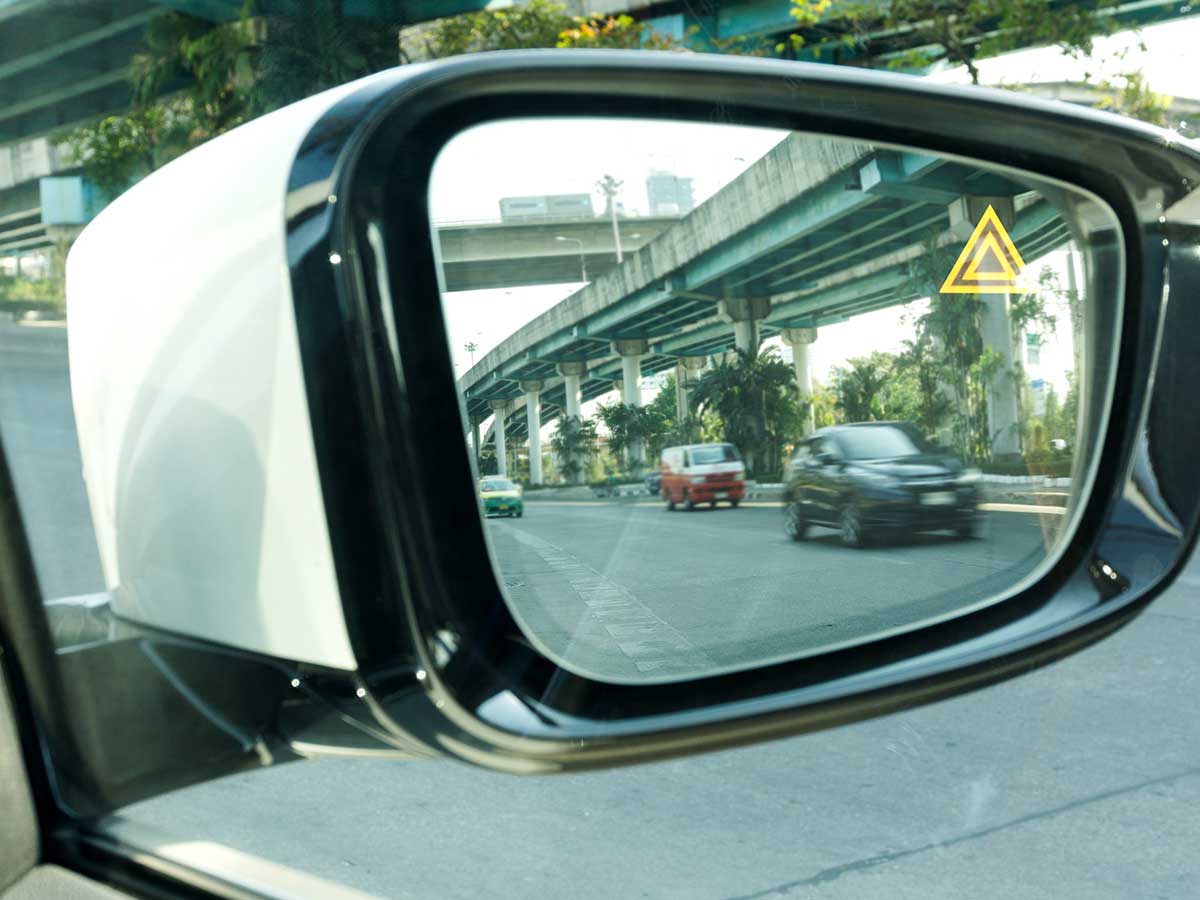 <p>This feature uses sensors on either side of the car to detect cars, with the hope of preventing collision. Blind Spot Monitoring helps drivers be aware of their surroundings while on the road.</p> <p>Some cars connect this feature with a camera view of the blindspot that appears on the driver dash display or the HUD.</p>