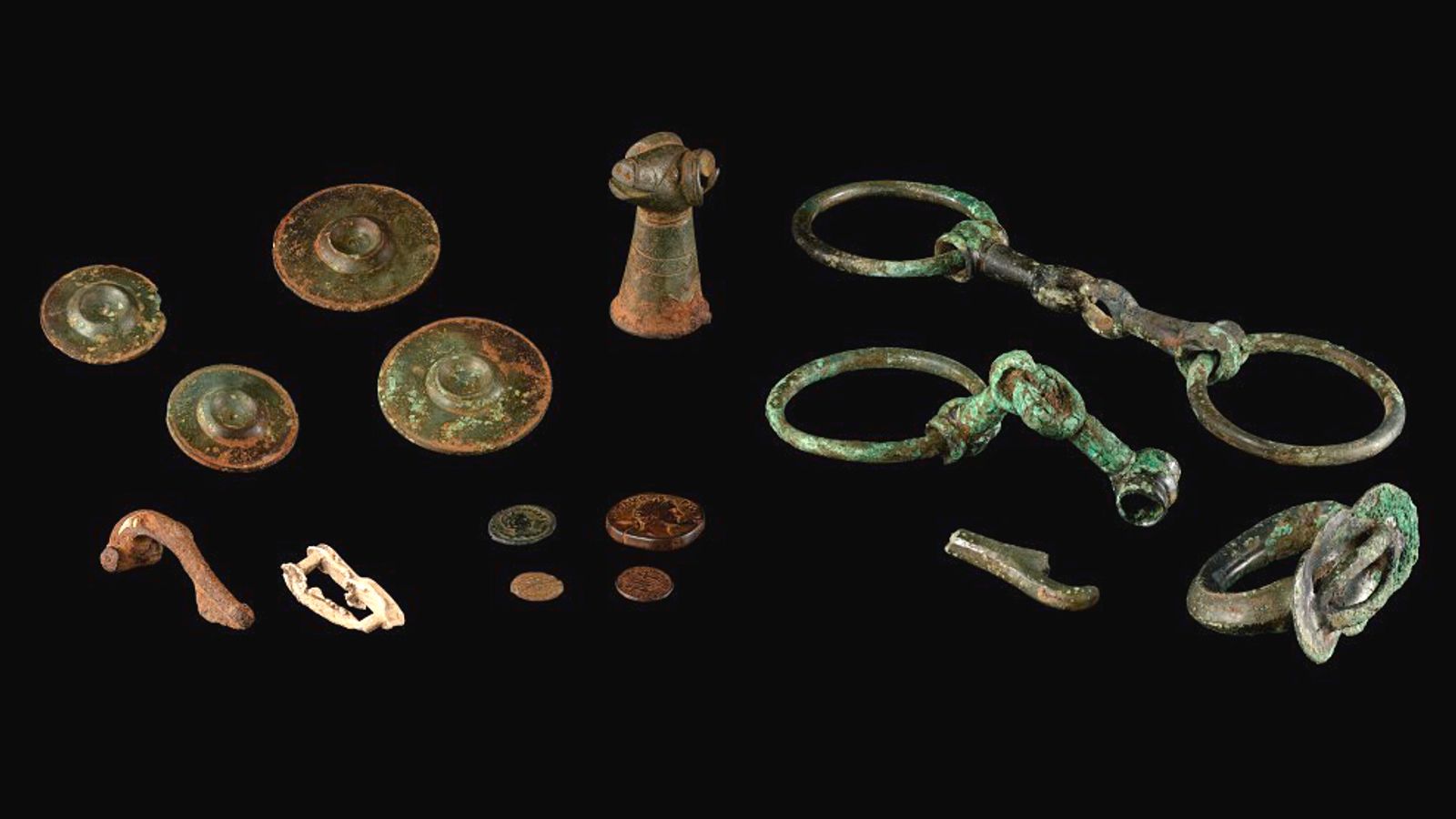 iron age and roman objects declared treasure after being found in 'boggy' field