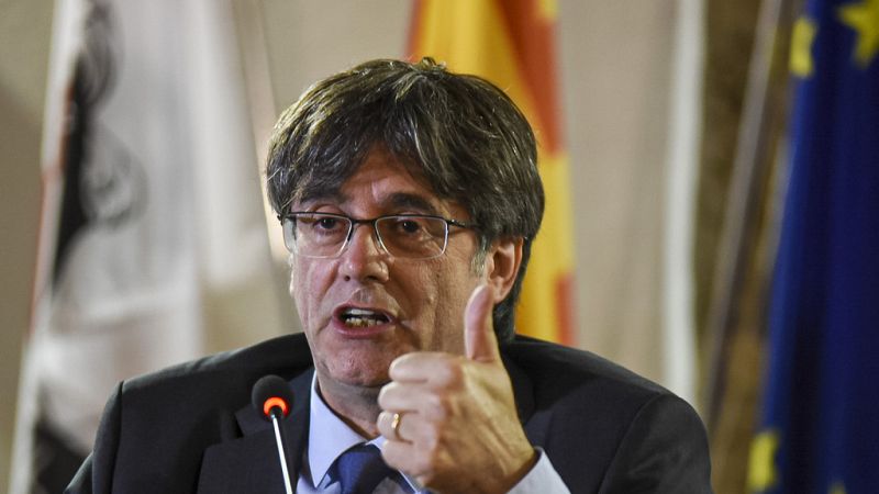spain launches terrorism case against former catalonia president puigdemont