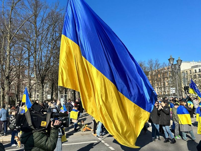ukrainians and russians in berlin in solidarity against war