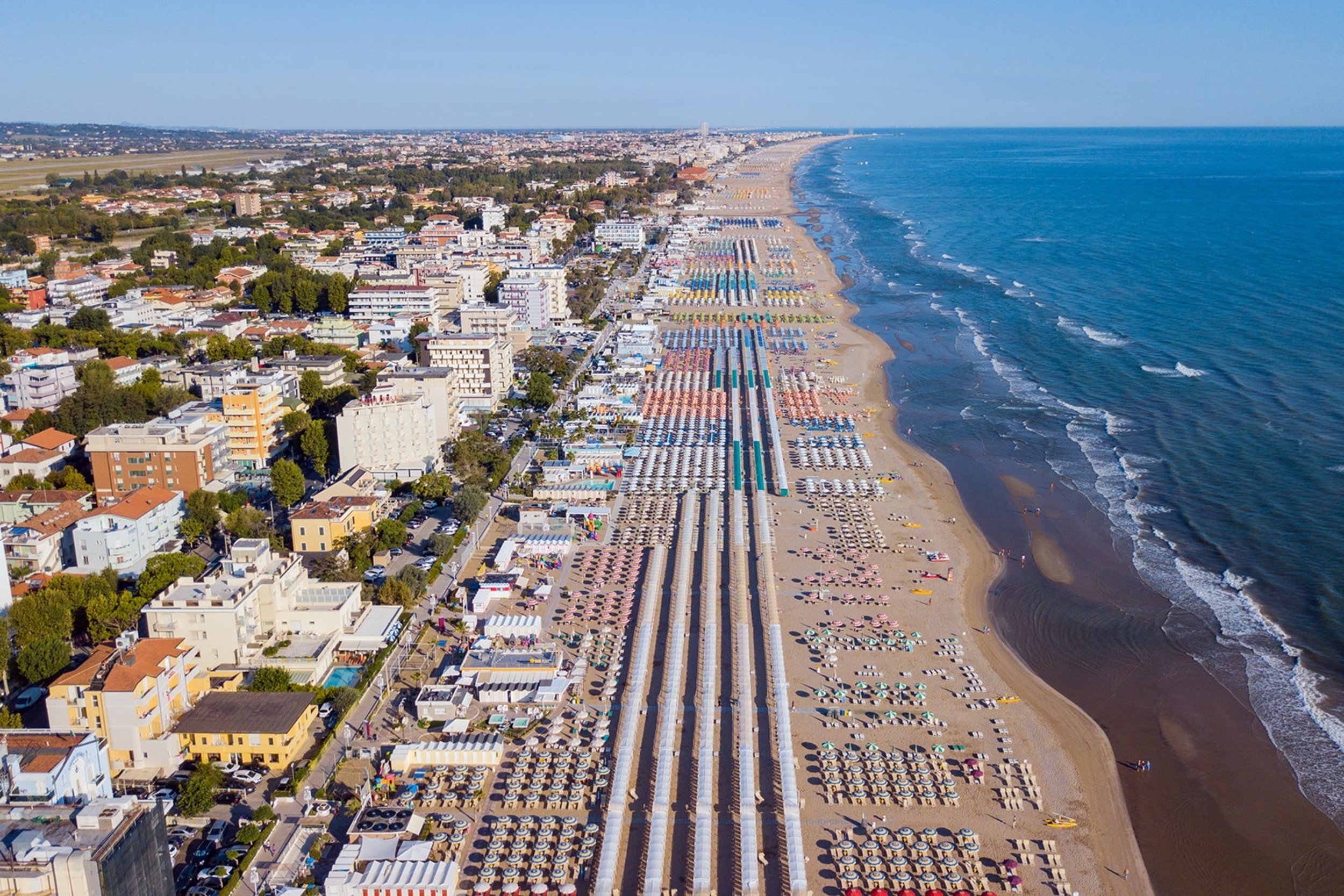 <p>Rimini is Federico Fellini's hometown, and you can see why. The long stretches of beach are packed with gorgeous women, bizarro characters, carnival rides, and splashes of color. This isn't the most picturesque town on our list, but it has the most personality. </p><p><a href='https://www.msn.com/en-us/community/channel/vid-cj9pqbr0vn9in2b6ddcd8sfgpfq6x6utp44fssrv6mc2gtybw0us'>Did you enjoy this slideshow? Follow us on MSN to see more of our exclusive lifestyle content.</a></p>