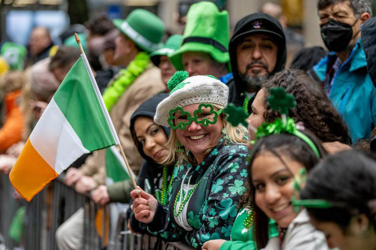 Spectators wear Irish-themed accessories during the 2022 NYC St Patrick's Day Parade