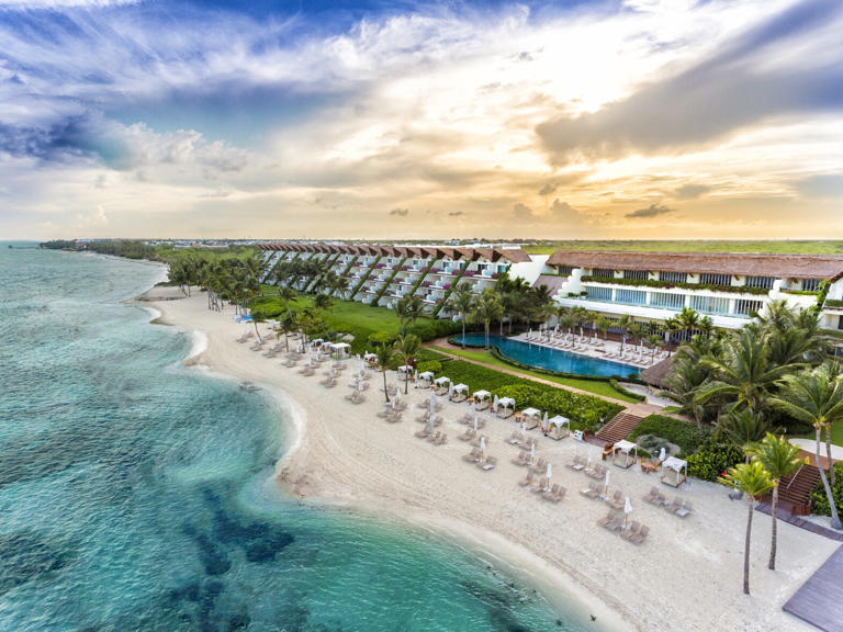Eight all inclusive summer vacations. Pictured: resort on Grand Class Beach.