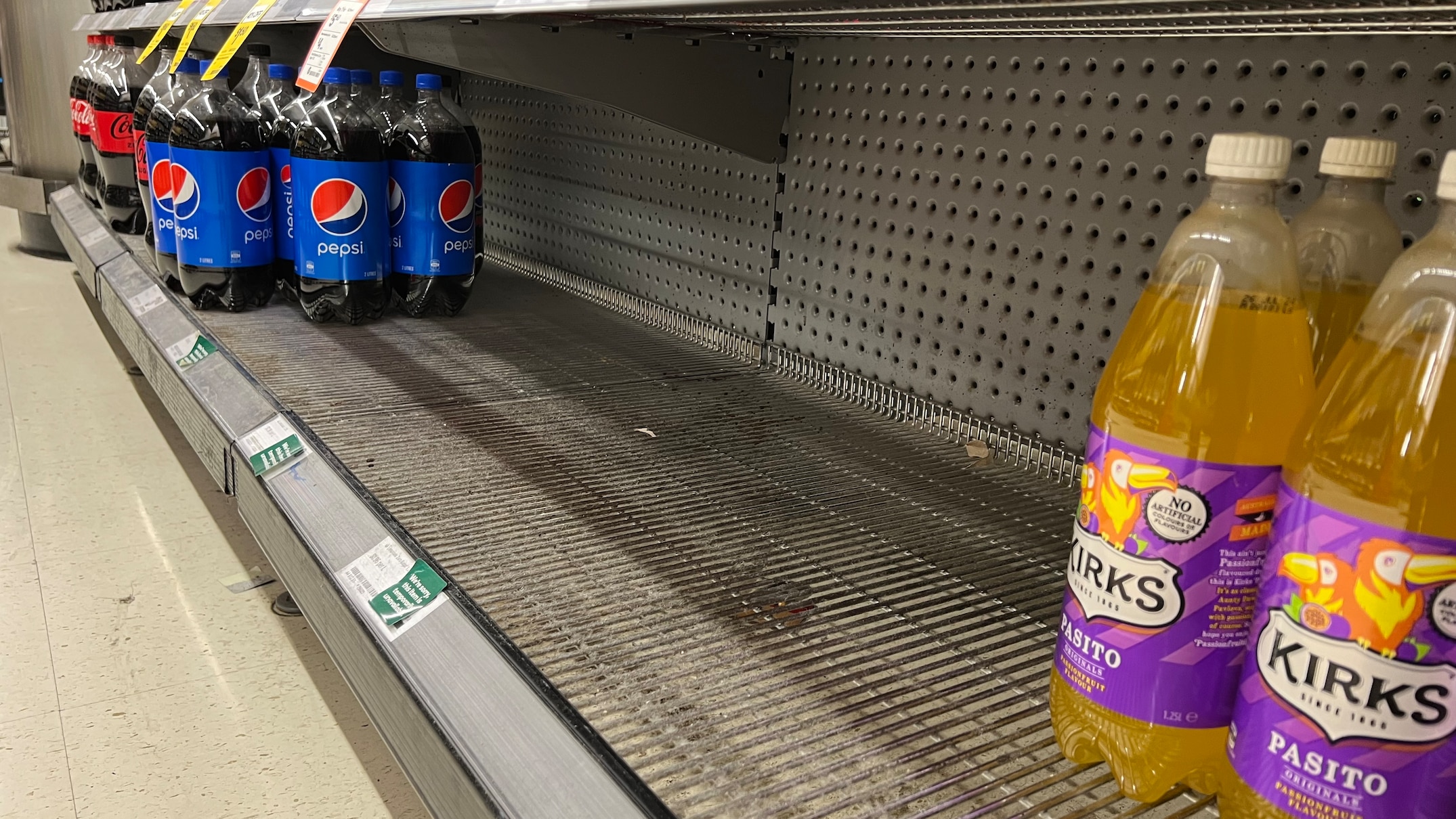 supermarket shelves depleted of soda water and soft drink amid low supply of carbon dioxide