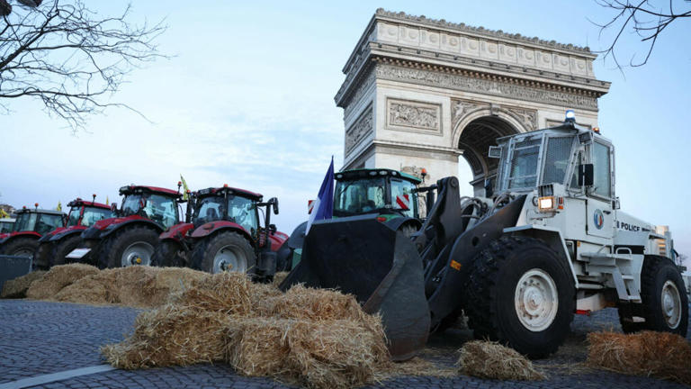 Police arrest more than 60 at farmers' protest on the Champs-Élysées in ...