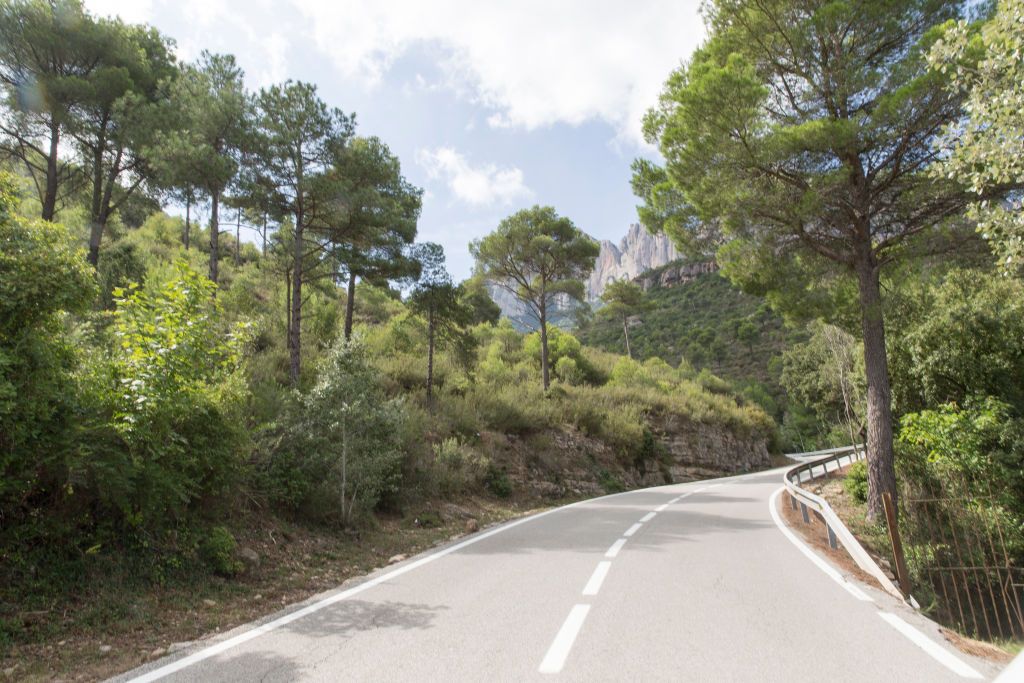 <p><strong>Requirements:</strong> U.S. driver's license, International Driving Permit</p><p>Even though you will find no shortage of fine driving roads and world-class history anywhere in Spain, you should probably start in the north amongst the Pyrenees and against the northern Atlantic coast. After that, make your way southeast, near Barcelona, where the zig-zagging roads up to Montserrat (pictured) offer great driving and striking views of the sheer rock climb. And that doesn't mean you shouldn't check out the south of Spain; the mountain roads up to El Chorro can be a good time, though you might try a weekday morning to avoid traffic.</p>