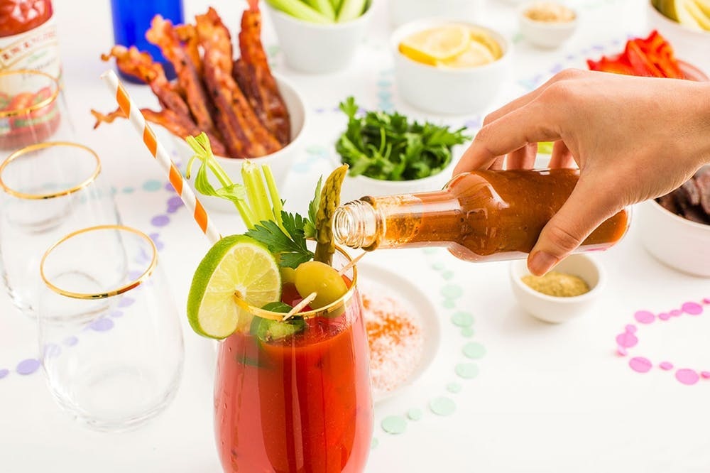Party-goers will sip and snack happily with a fully loaded drink, complete with pickled veg, bacon, and more noshable goodies. Hot sauce optional but encouraged. (via Brit + Co<strong>.</strong>)