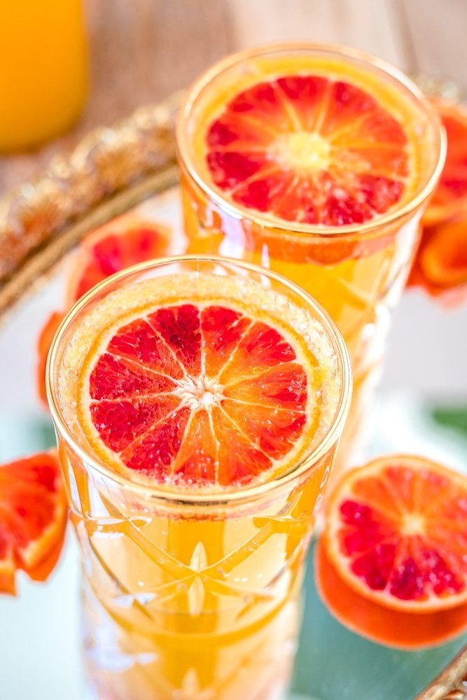 Just revel in that drink presentation! With just OJ and sparkling wine, you've got yourself a friendly sipper. (via Two Spoons)