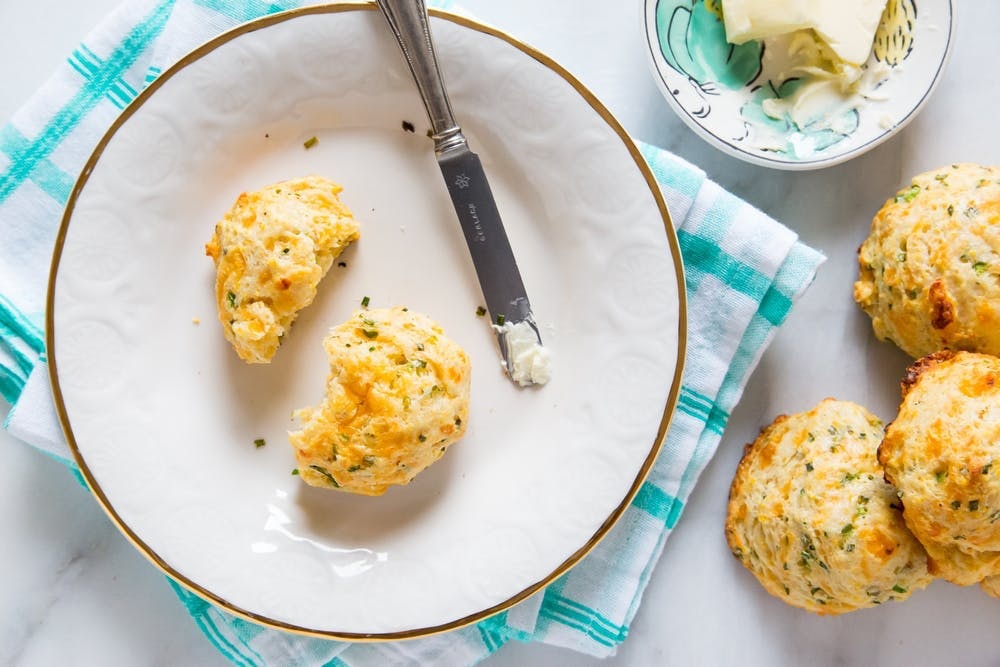 These drop biscuits are almost like cornbread and have the added bonus of cheddar, chives and jalapeños mixed into the batter. Spread a bit of butter or experiment with spicy and sweet flavors by adding some jam instead. (via Brit + Co.)