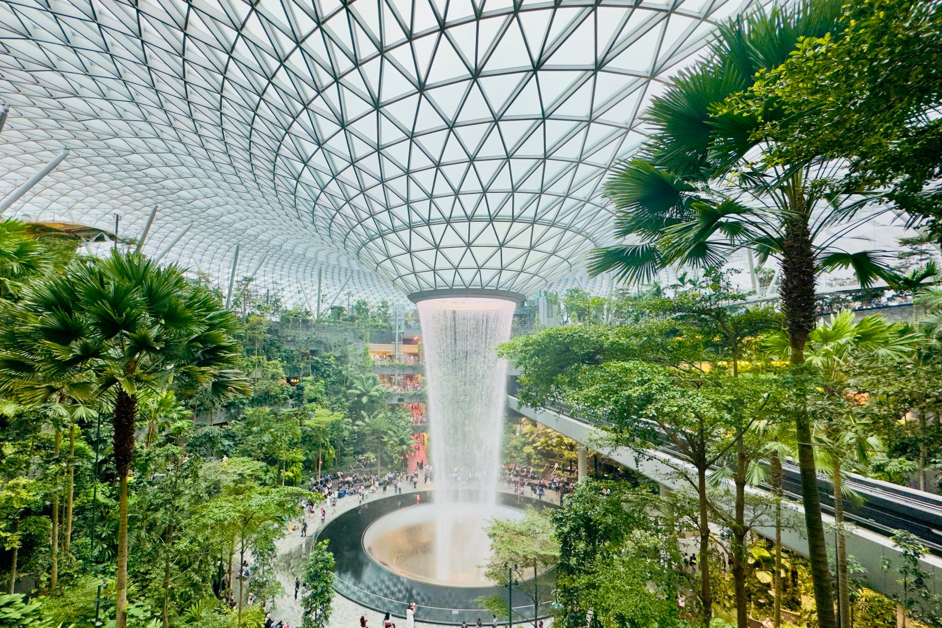 <p>Surroundings that enhance the perception of nature through sight, sound, or overall contact with water, relieve tension and stress, and restore a feeling of serenity and peace. In the image, you can see a part of the Jewel Changi, a shopping mall and entertainment complex in one of the terminals at Changi Airport, in Singapore.</p>